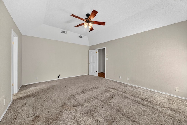 2209 Southampton Ln, Midland, TX 79705 - spare room featuring ceiling fan, carpet flooring, and vaulted ceiling