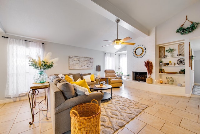 438 W Pine Ave, Midland, TX 79705 - living room featuring light tile patterned flooring, a brick fireplace, a ceiling fan, and built in shelves