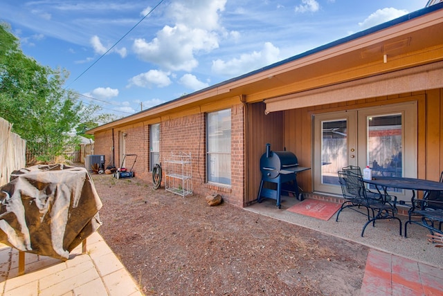 438 W Pine Ave, Midland, TX 79705 - view of patio with grilling area and french doors