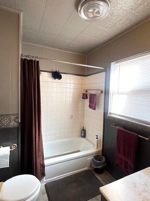 3702 Dalton Dr, Snyder, TX 79549 - bathroom with toilet, shower / tub combo with curtain, and crown molding