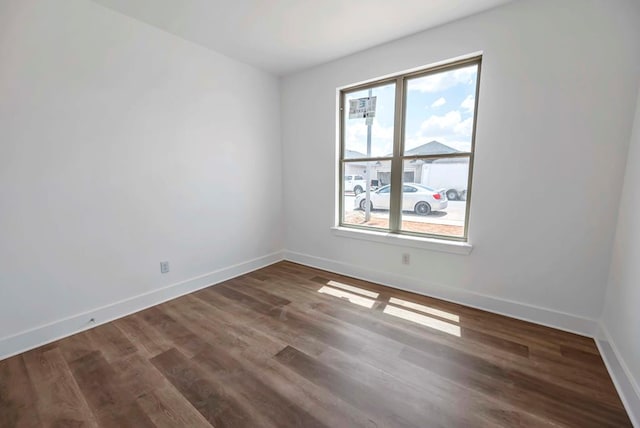 8643 Santa Isabella, Odessa, TX 79765 - unfurnished room with baseboards and wood finished floors