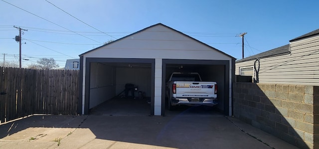 detached garage with fence