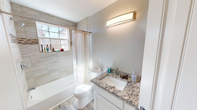 full bathroom with shower / bath combination with curtain, vanity, toilet, and wood finished floors