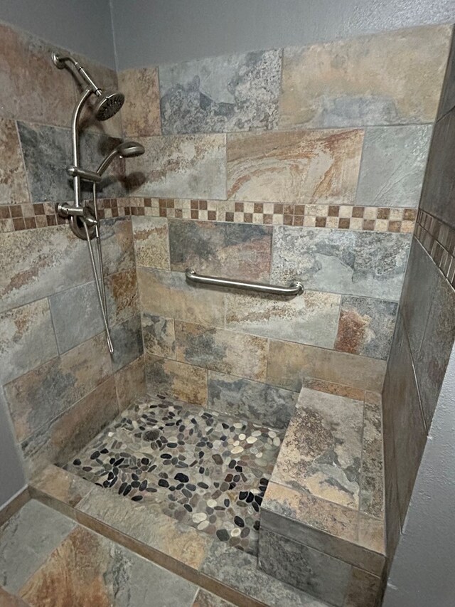 interior space with tiled shower