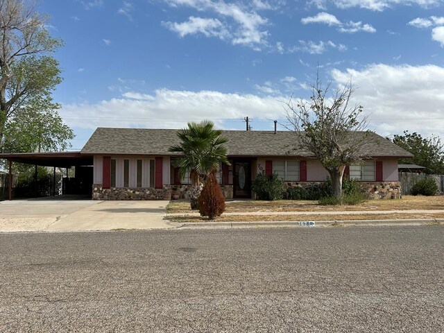 view of front of home featuring a carport