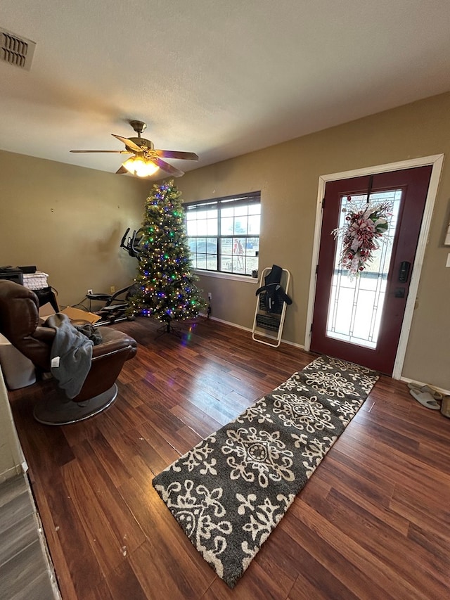 entrance foyer featuring hardwood / wood-style floors and ceiling fan