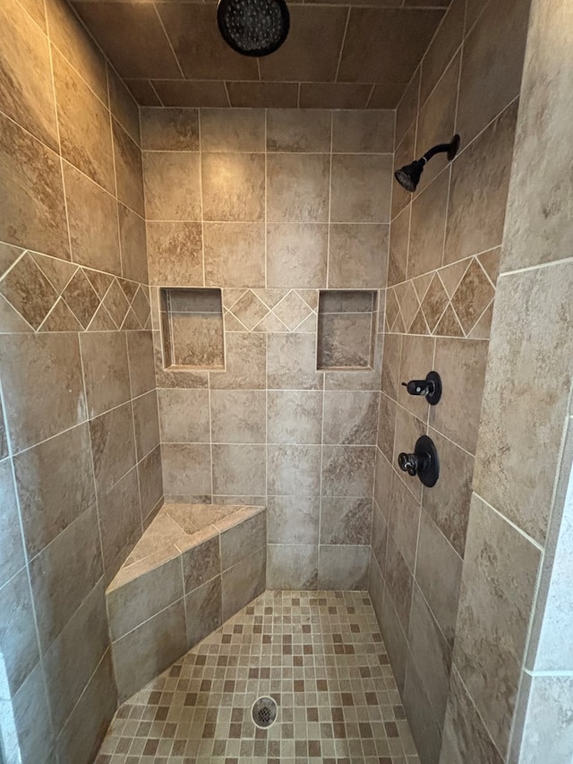bathroom featuring a shower stall
