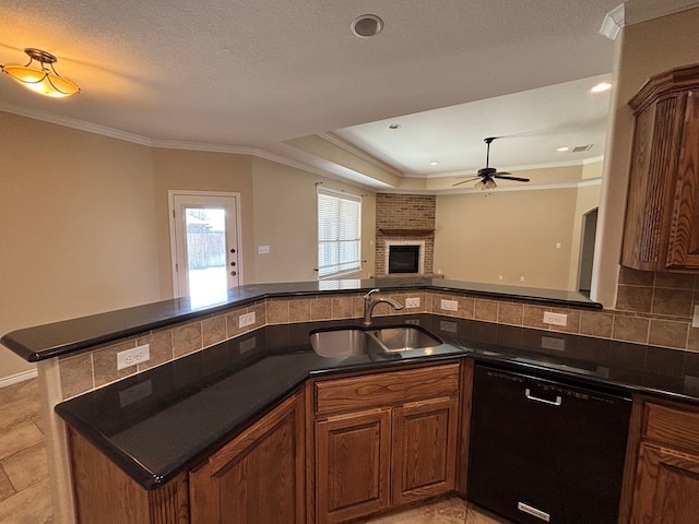 kitchen featuring a sink, ceiling fan, black dishwasher, and crown molding