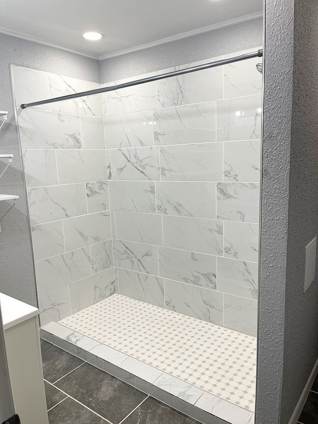 full bathroom with recessed lighting and tiled shower