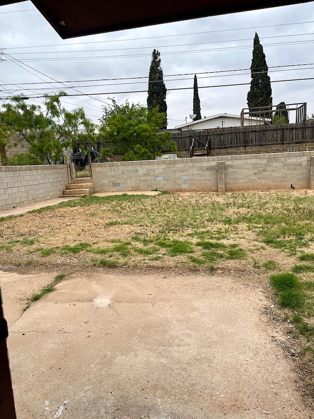 view of yard featuring fence