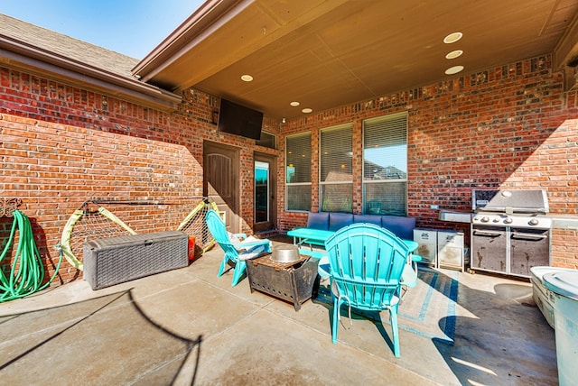 view of patio / terrace with grilling area and an outdoor living space