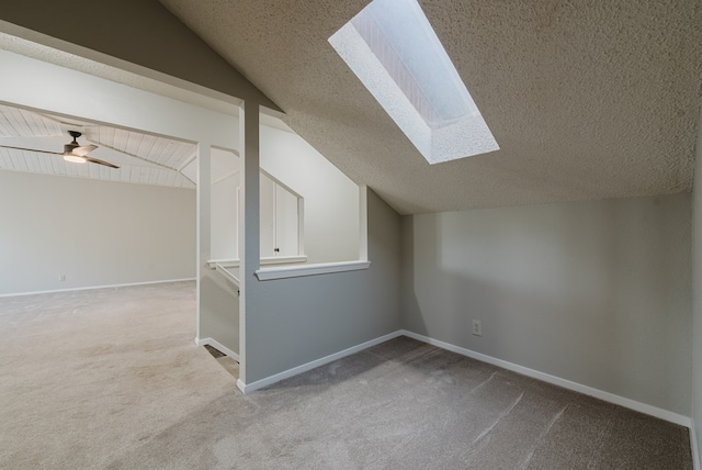 4106 Dyer Cir, Midland, TX 79707 - bonus room featuring lofted ceiling with skylight and a textured ceiling