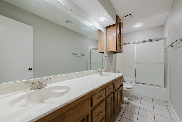 4106 Dyer Cir, Midland, TX 79707 - full bath featuring double vanity, tile patterned flooring, toilet, and visible vents
