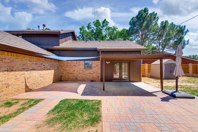 4106 Dyer Cir, Midland, TX 79707 - exterior space with french doors, a storage shed, fence, an outdoor structure, and a patio