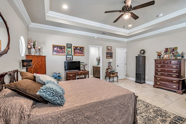 bedroom with baseboards, visible vents, ornamental molding, and a raised ceiling