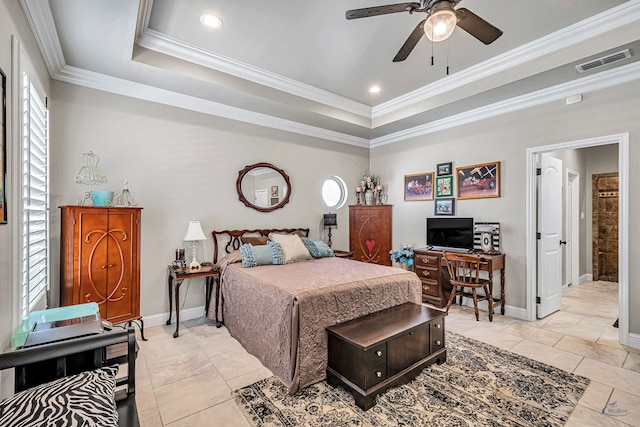 bedroom featuring baseboards, crown molding, visible vents, and a tray ceiling