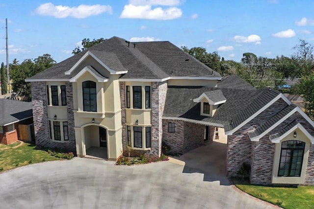 view of front facade with a carport