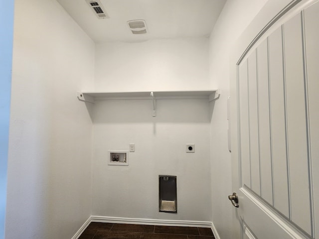 laundry area with visible vents, baseboards, laundry area, hookup for a washing machine, and electric dryer hookup