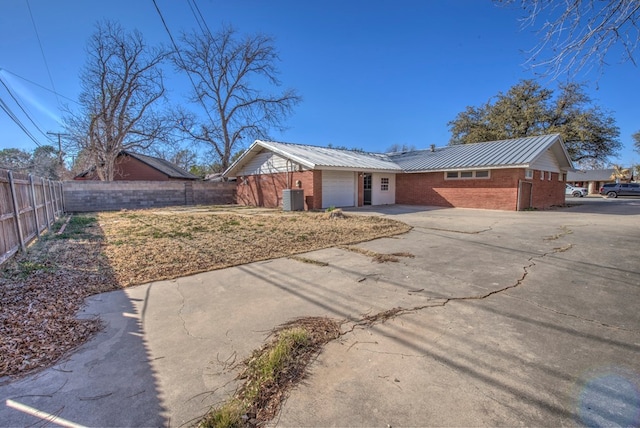 view of front of home featuring cooling unit