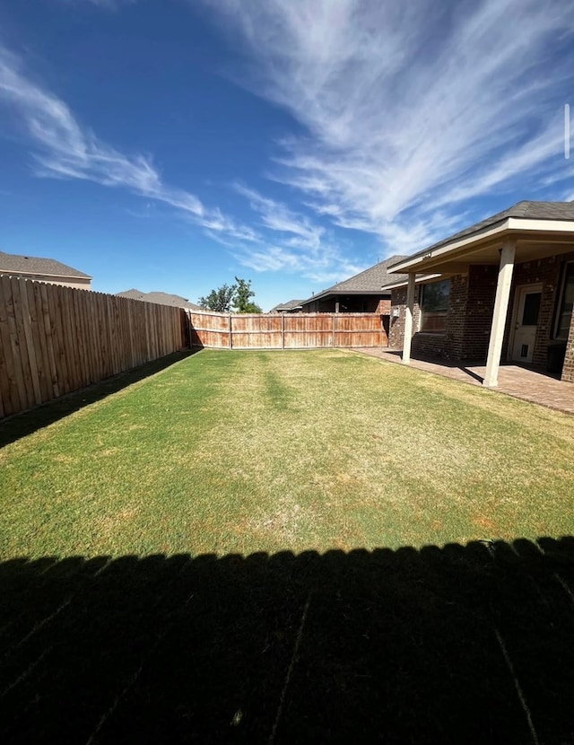 view of yard featuring a patio