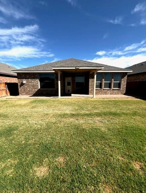 6609 Colony Rd, Midland, TX 79706 - rear view of house with brick siding