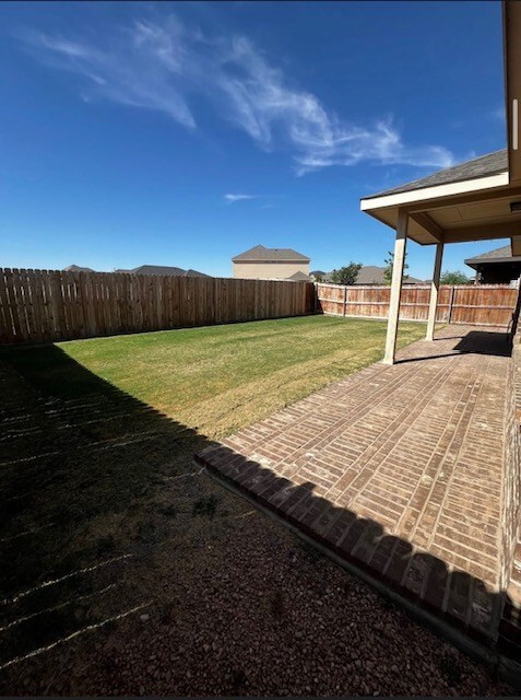 view of yard with a patio area