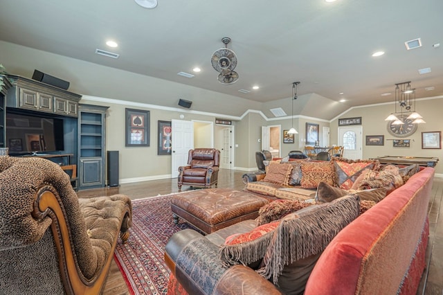 living area featuring crown molding, pool table, visible vents, vaulted ceiling, and wood finished floors