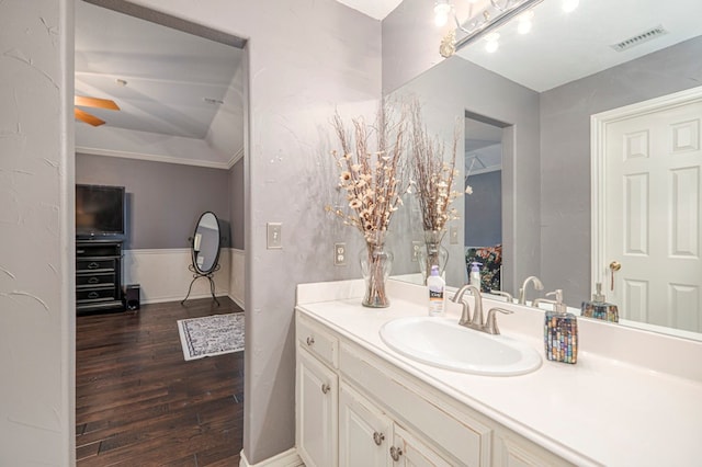 bathroom with vanity, wood finished floors, and visible vents