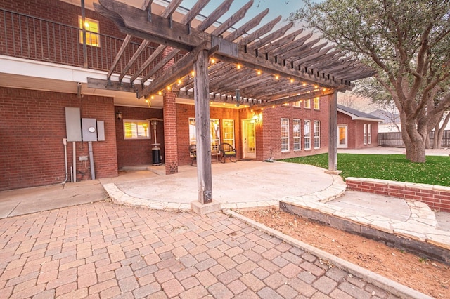 view of patio / terrace with fence and a pergola