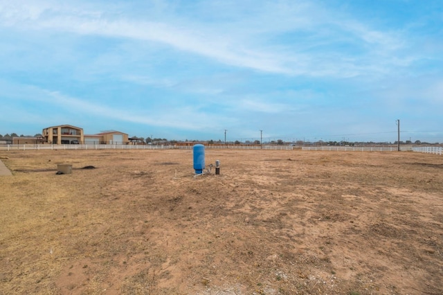 view of yard with an enclosed area and fence