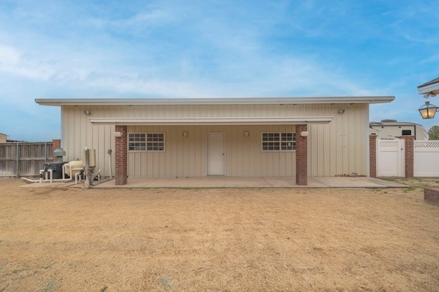 view of outdoor structure with fence