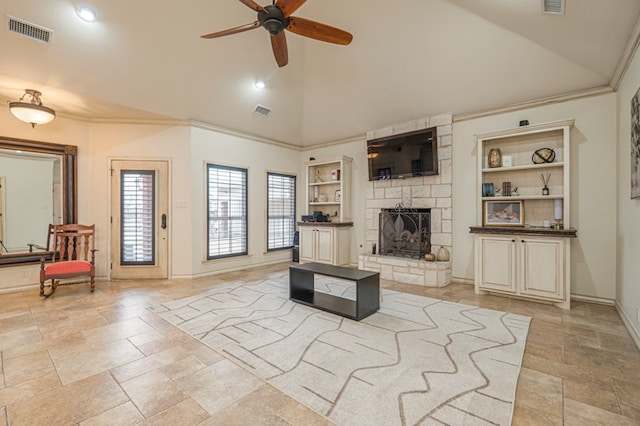 living room featuring crown molding, visible vents, and built in features