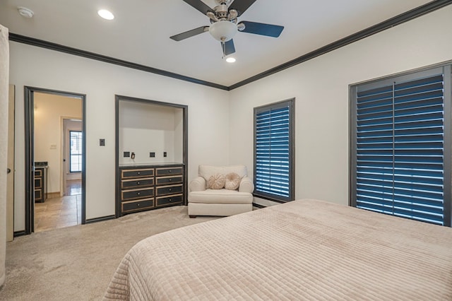 carpeted bedroom with baseboards, ornamental molding, a ceiling fan, and recessed lighting