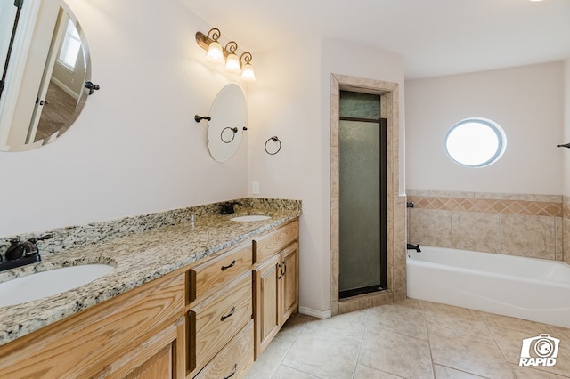 full bath with a shower stall, a garden tub, tile patterned floors, and a sink