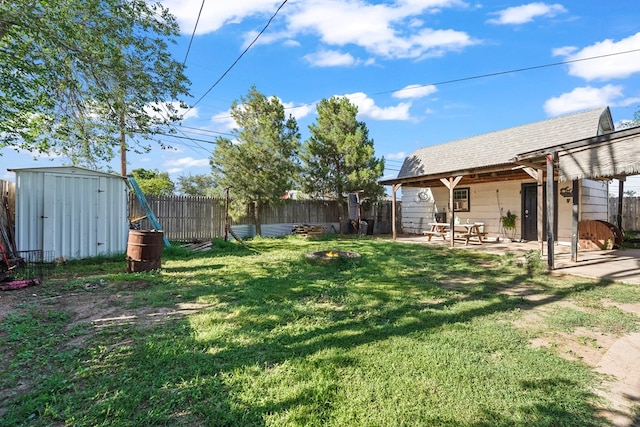 3804 Cedar Spg, Midland, TX 79703 - fenced backyard with a storage shed and a patio