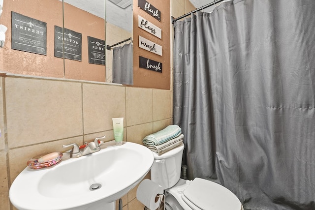 3804 Cedar Spg, Midland, TX 79703 - full bathroom featuring tile walls and a shower with shower curtain