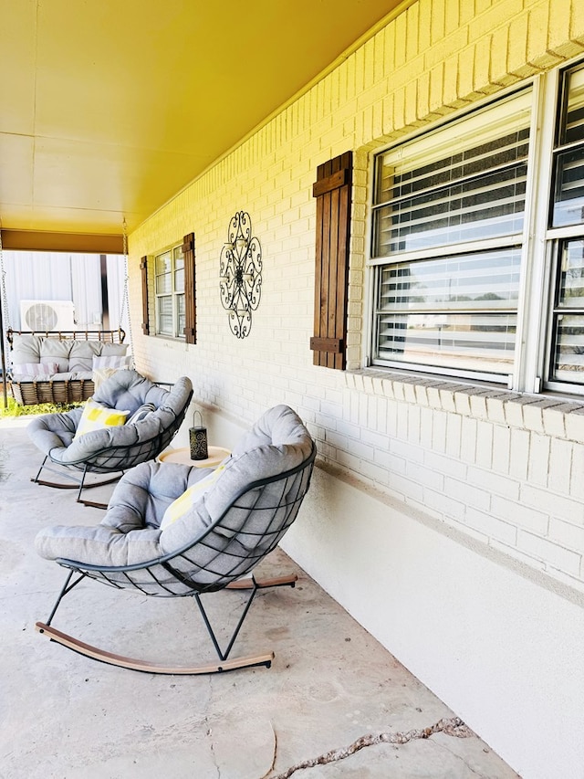 view of patio featuring a porch