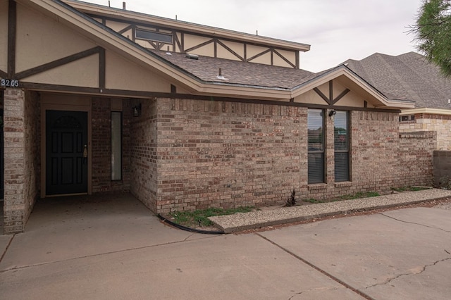 3205 Dentcrest Dr Unit B, Midland, TX 79707 - property entrance with stucco siding and brick siding
