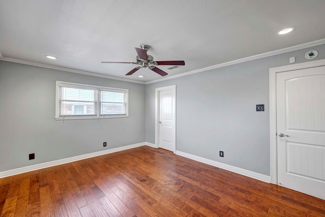 1002 Boyd Ave, Midland, TX 79705 - unfurnished room featuring baseboards, ceiling fan, crown molding, and hardwood / wood-style flooring