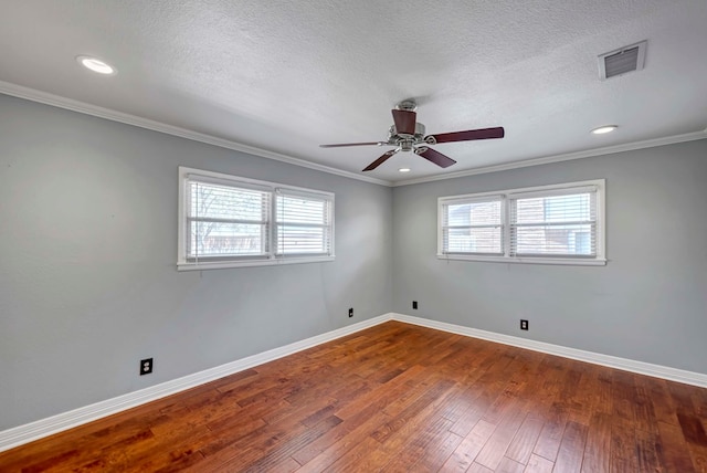 1002 Boyd Ave, Midland, TX 79705 - empty room with hardwood / wood-style floors, baseboards, visible vents, and a ceiling fan
