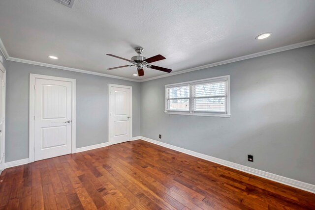 1002 Boyd Ave, Midland, TX 79705 - unfurnished bedroom with baseboards, ornamental molding, and wood-type flooring