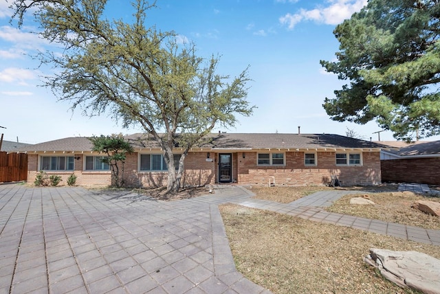 1002 Boyd Ave, Midland, TX 79705 - view of front of property featuring brick siding and fence