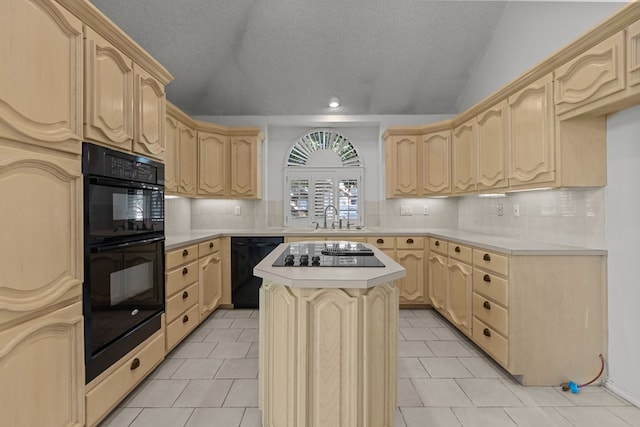 kitchen with light brown cabinets, black appliances, and lofted ceiling