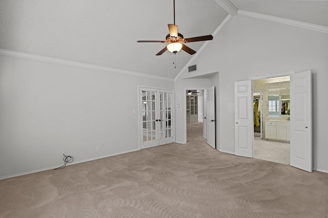 interior space with french doors, light carpet, visible vents, and ornamental molding