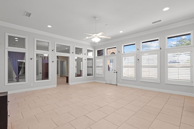 unfurnished sunroom with a ceiling fan and visible vents