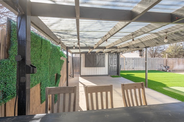 view of patio with a fenced backyard and a pergola