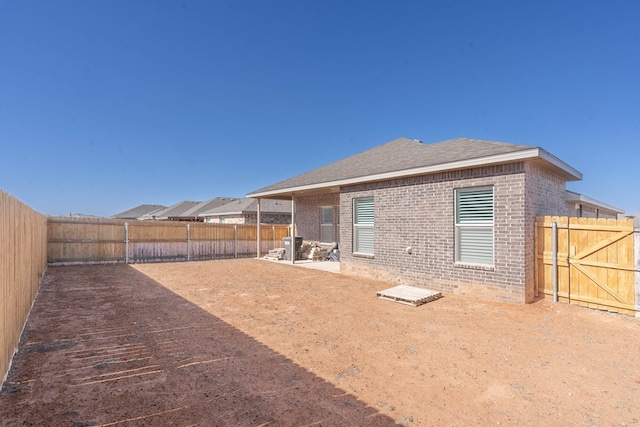 back of property with a patio area