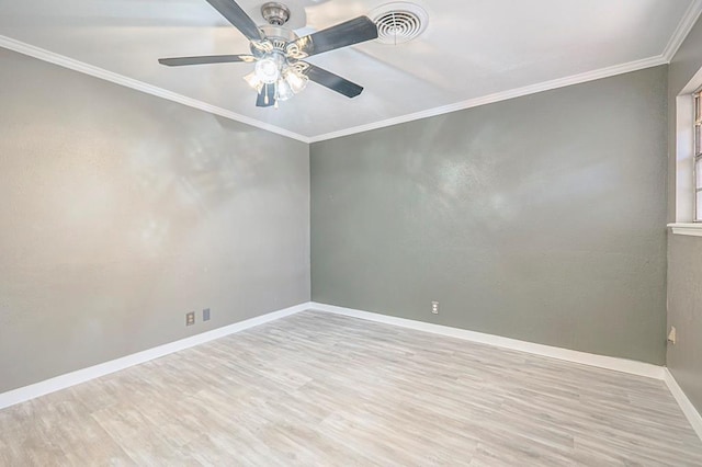 spare room with crown molding, ceiling fan, and light hardwood / wood-style floors