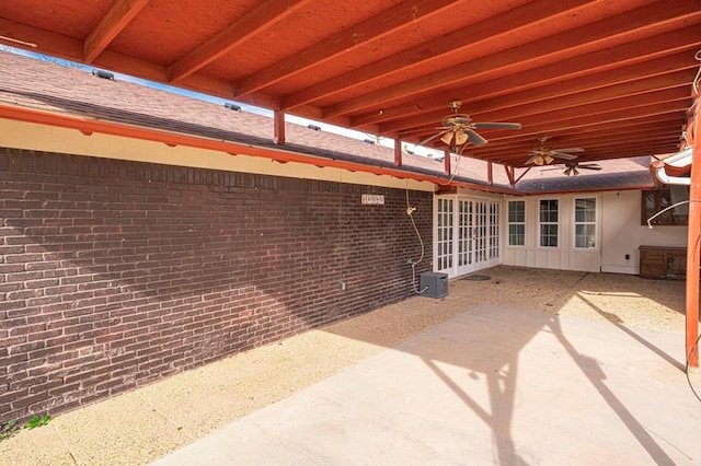 view of patio / terrace with a ceiling fan and french doors