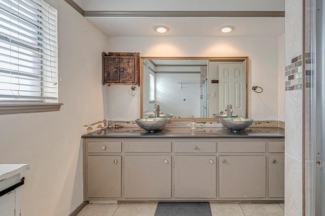 bathroom with vanity and tile patterned floors